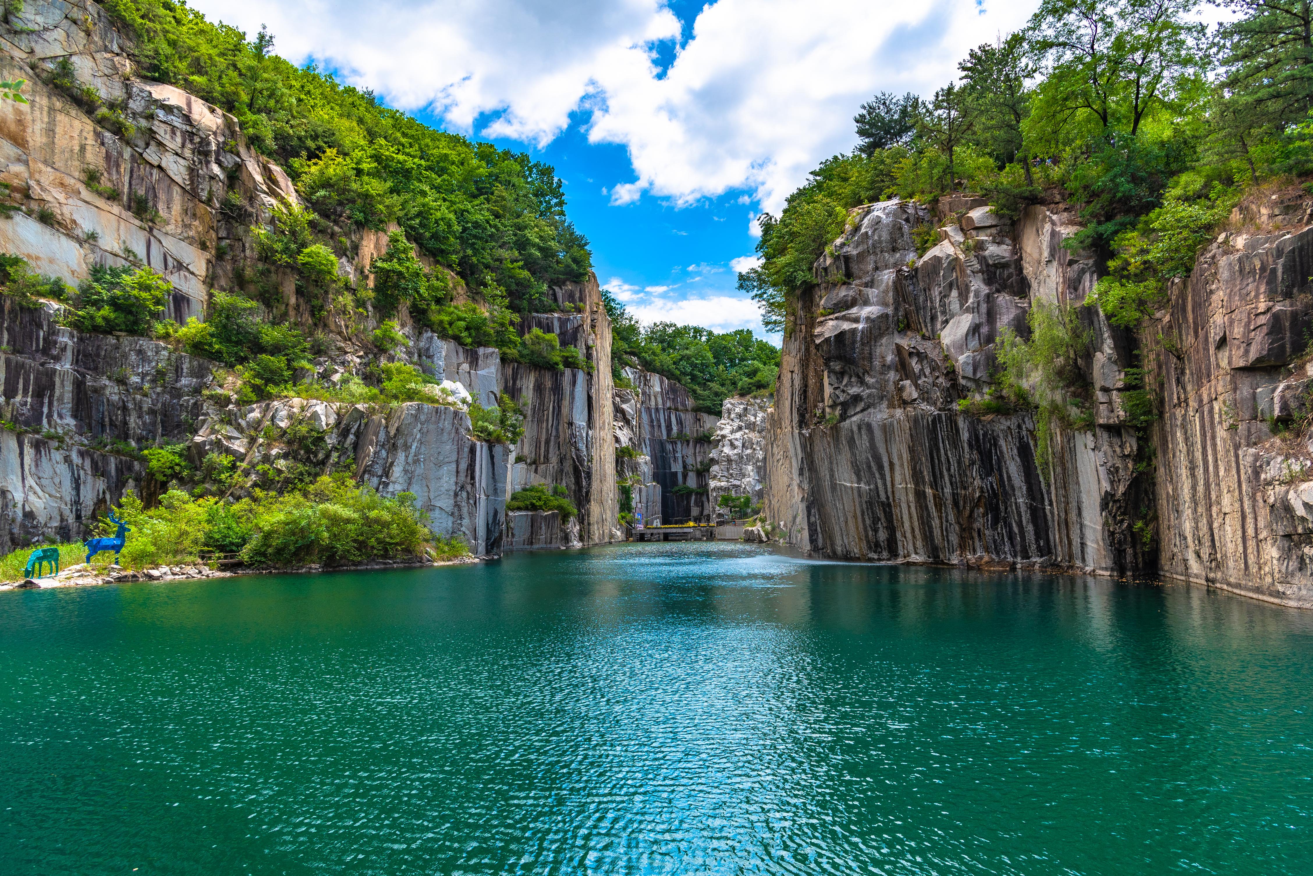 Discover the beauty of Pocheon Art Valley where stunning cliffs meet tranquil waters creating a perfect backdrop for relaxation and inspiration amidst nature's artistry. Enjoy a day filled with adventure.